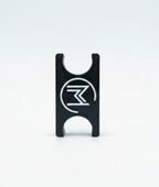 Close-up of black in-Motion Handy Clip with white logo