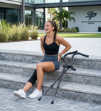 Person on stairs using In-Motion Freedom crutches sized for heights 4'11" to 5'7"