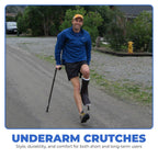Man walking on a road with in-Motion Pro underarm crutches